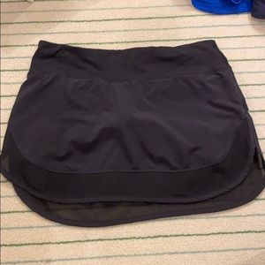 Lulu Lemon Black tennis skirt w/ mesh bottom